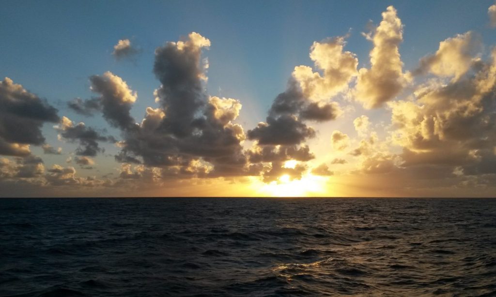 Photo of a sunrise over the ocean